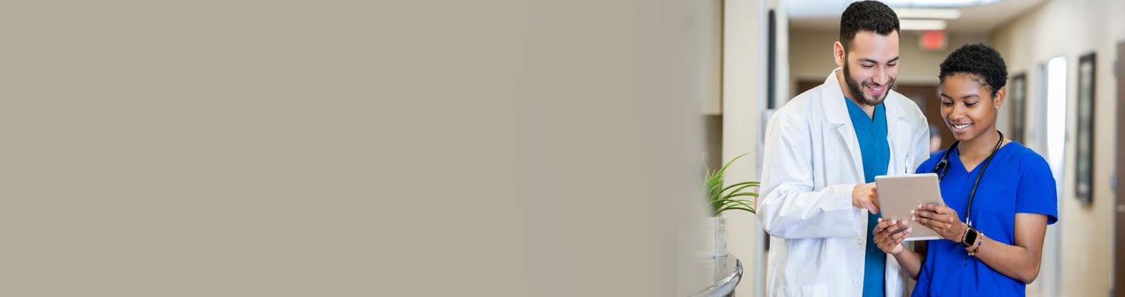 Male & female healthcare professionals in office