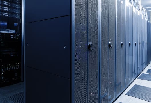 An image of a row of equipment with the doors closed