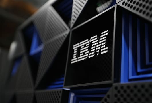 A close up image of the IBM logo on equipment