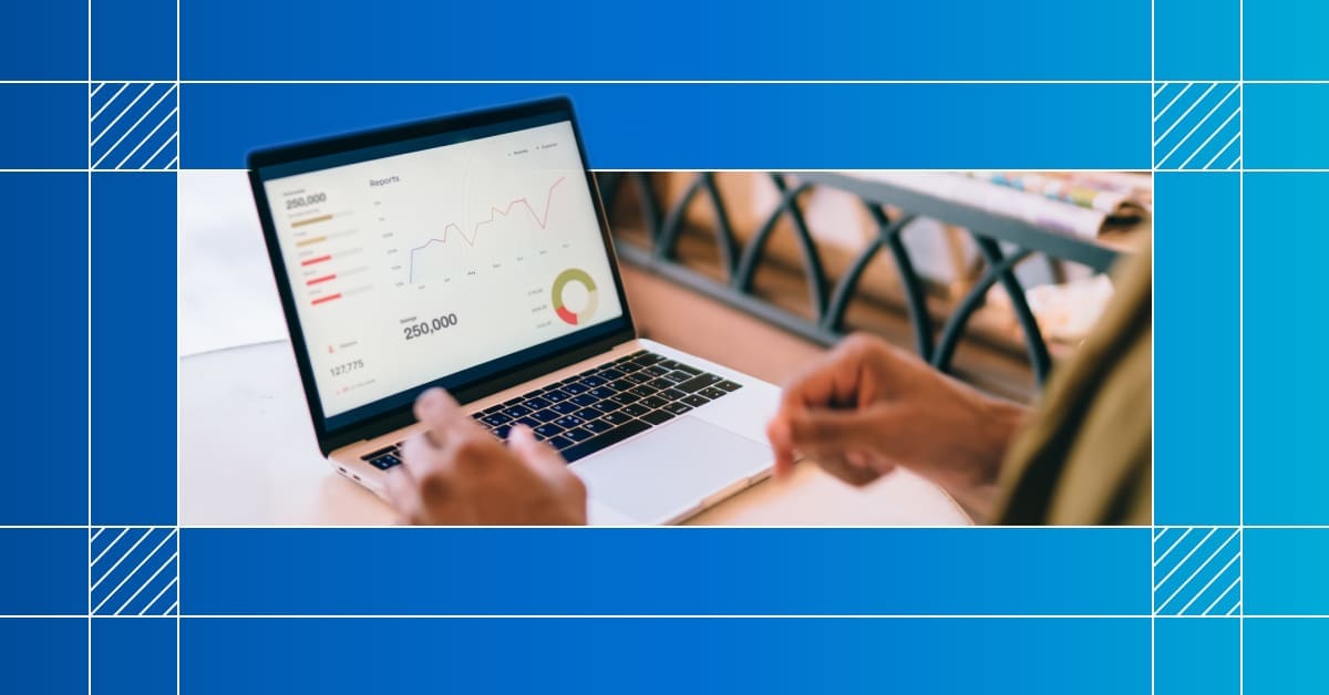 An image of a dashboard with charts and graphs on a laptop