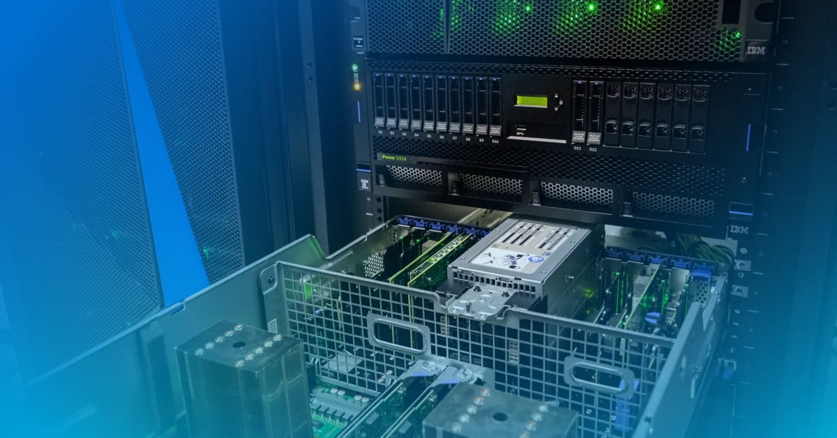 An image of IBM equipment open in a data center rack