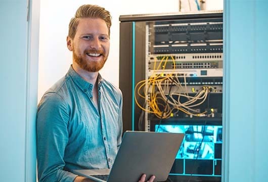 Engineer Smiling with Laptop