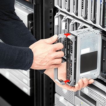 Close Up of Hands Inserting Technical Equipment