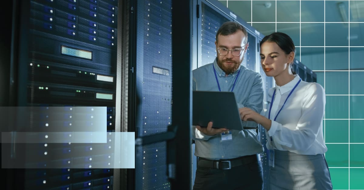 Two Engineers Pointing to Laptop