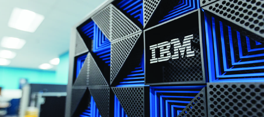 A close up of the IBM logo on equipment